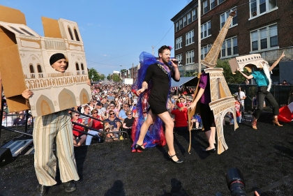 People on stage in costumes