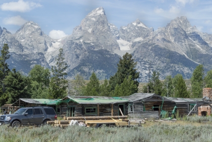 The main lodge of the Bar BC under the dramatic backdrop of Grand Teton. 