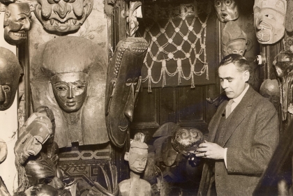 B&W photo of an assortment of African artifacts