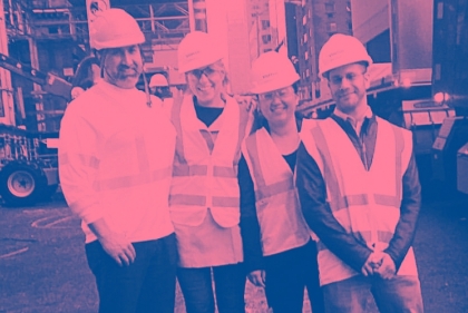 Taylor Knoche with workers on site