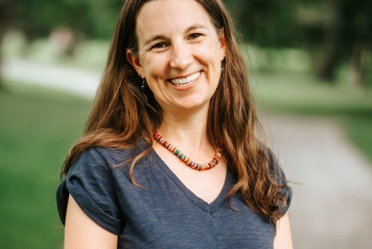 Portrait of Erin Tobin in front of nature trail