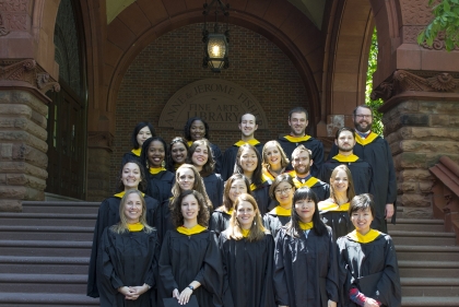 Historic Preservation graduates on the steps of the Fisher Fine Arts Library.