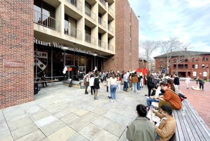 Student enjoying happy hour on the Plaza