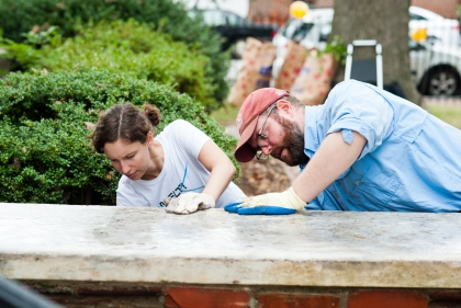 Students working on historic preservation