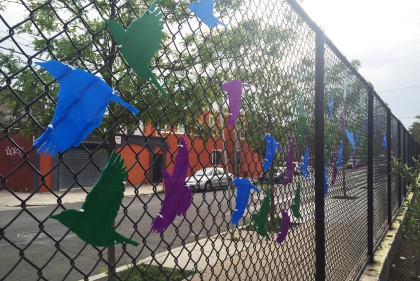 Bird designs on chain link fence at William Cramp Elementary School