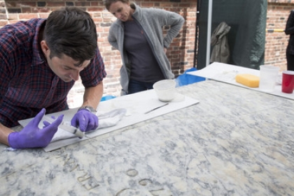 Using a syringe filled with a breathable, lime-based injection grout, Federico and his team filled the voids of Franklin’s marble grave marker.