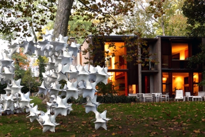 Award winning Penn Pavilion in front of modernist home.