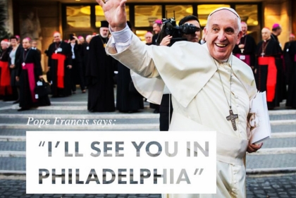 Sign for Pope's visit to Philadelphia saying "Ill see you in Philadelphia" picture of the Pope waving as the background
