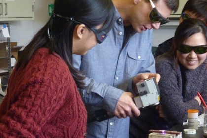 Students working with laser cleaning