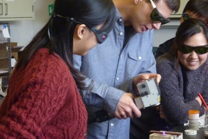 Students working with laser cleaning