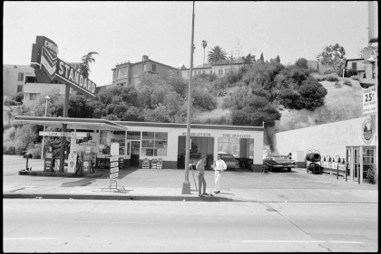 Black and white photo of Standard gas station