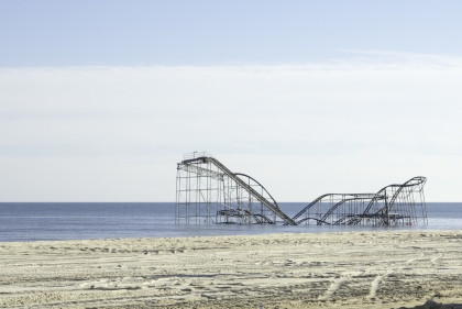 Partially submerged roller coaster on a sunny day