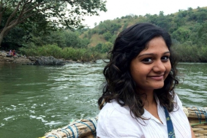 Shruthi Arvind on a boat on a river