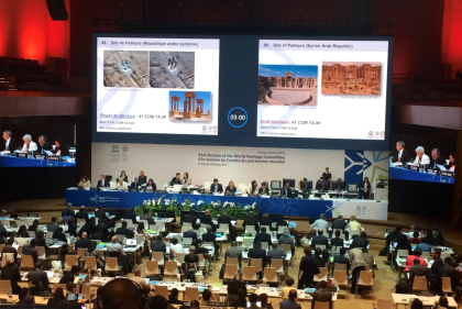 View of stage with projected images at international conference