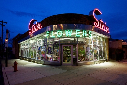 Flower store with big neon signs