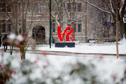snowy campus with LOVE statue
