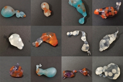 Many different pieces made of blobs of colored glass