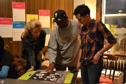 Students work with community members to provide interactive input into the garden design during charrette