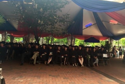 Commencement audience under tent