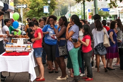 People in line for food stall at dollar days