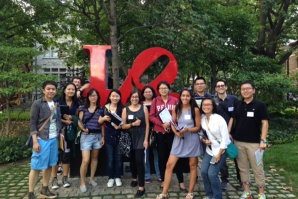 Group photo in front of LOVE sign