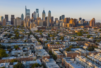 Aerial photo showing the street grid of Philadelphia with skyline in the distance