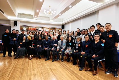 Group of people seated for photo