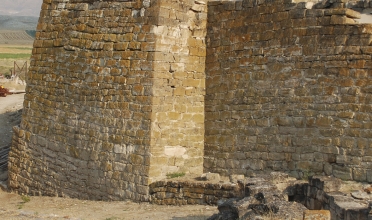 Stone wall from an ancient structure at the archaeological site.