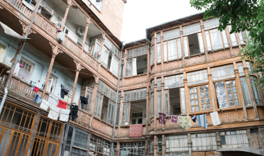 Art Nouveau courtyard with laundry hanging on lines