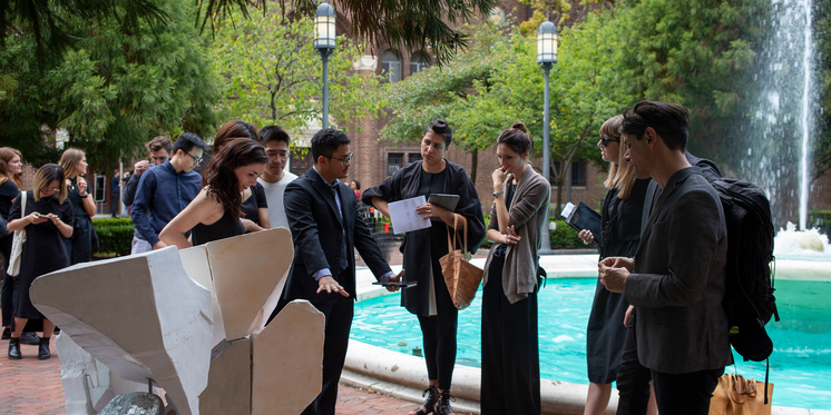 Students gathered outside on campus for final reviews.