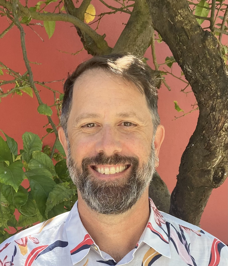 Prof. Barber smiling