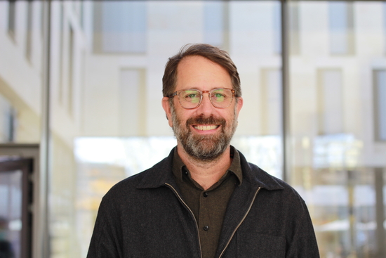 Prof. Barber smiling