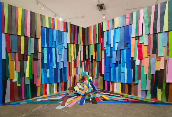 Multicolored art piece in gallery