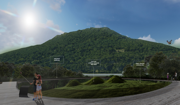Elevated walkway around preserved civil war artillery mounds, with a mountain in the background 