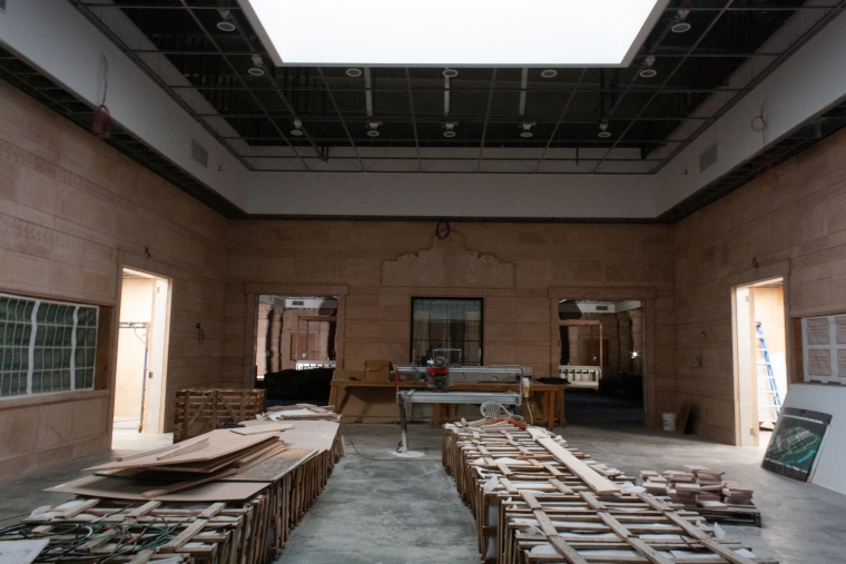 Interior of the New Hindu Temple showing crates of pink sandstone