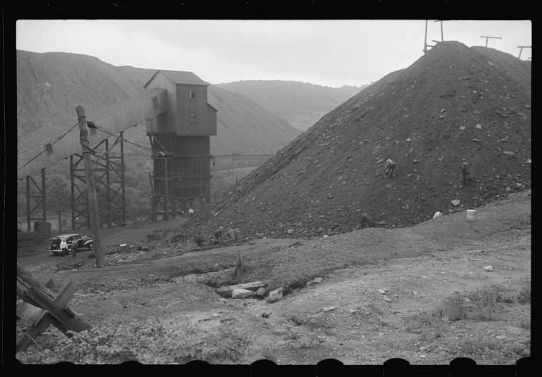 Black and white photo of slag mounds