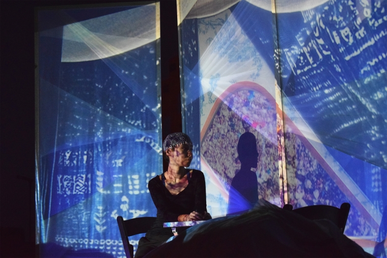 Still from "Toile du Jour": a speculative 10-minute act exploring migration, climate change, and fast fashion, performed in Meyerson Hall on December 6, 2024. 