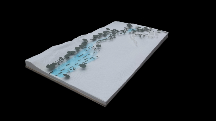 Physical model made of foam core and dyed resin demonstrating the green corridor and water flow on the regraded site