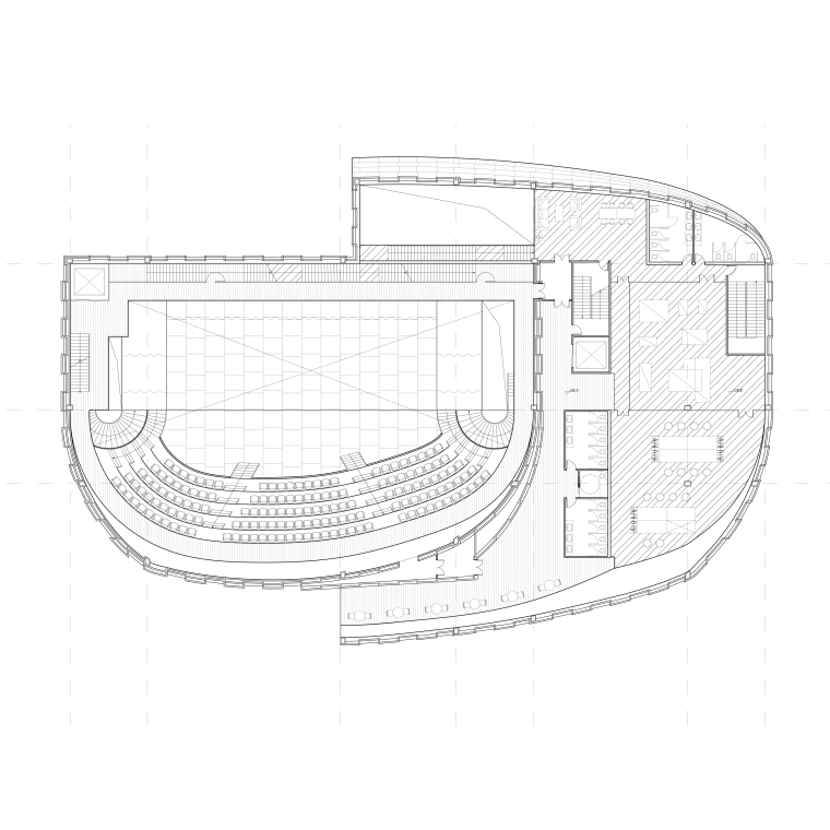 Floor plan of the orchestra level showing the interwoven layout of public and backstage areas, distinguished by two hatch types. Circulation passes naturally through openings shaped by the project’s geometry, allowing moments of overlap between audience movement and stage function.