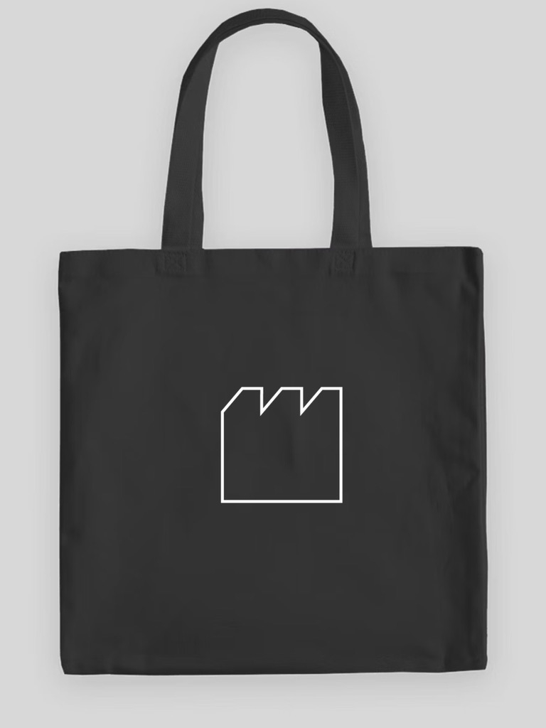 A black tote bag with an abstracted image of the outline of Meyerson Hall