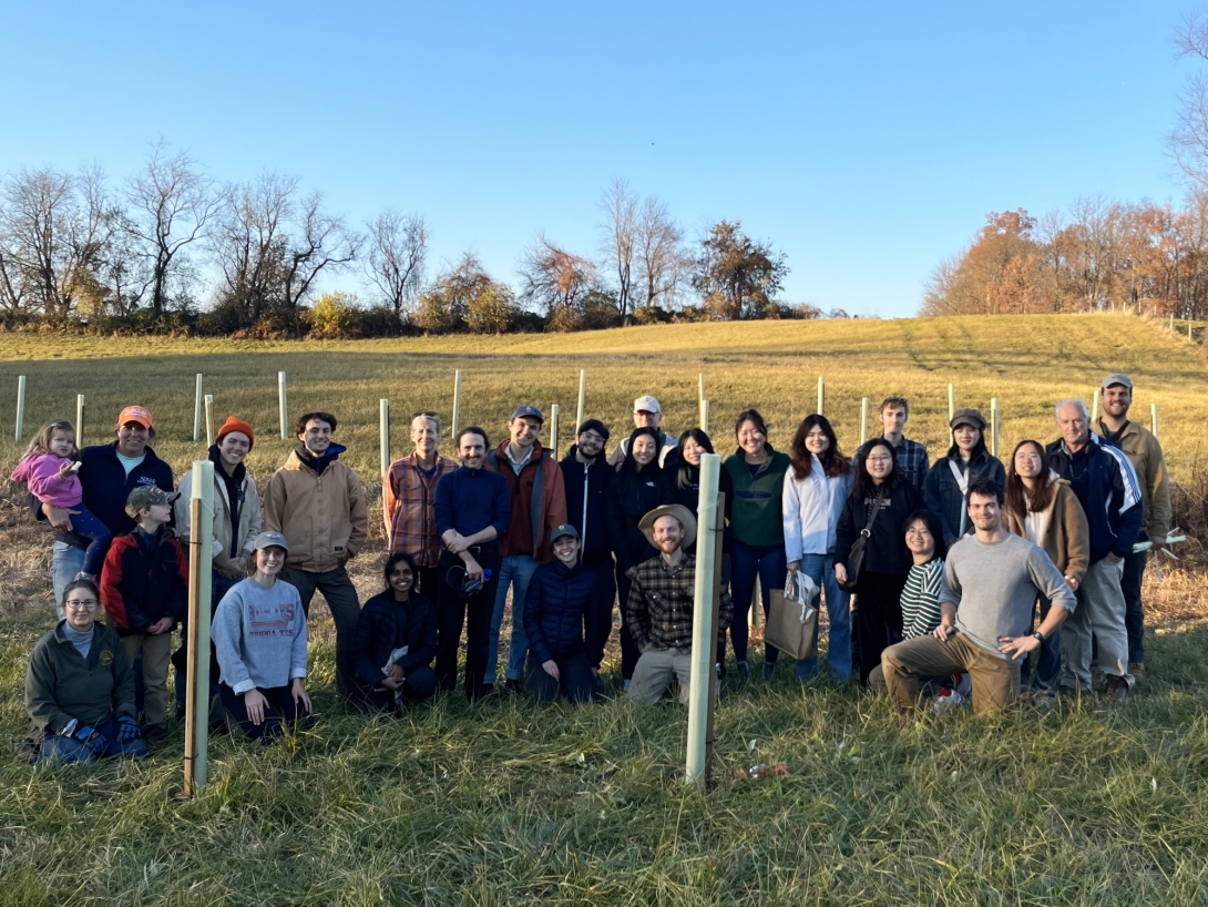 Group of people standing in farmland