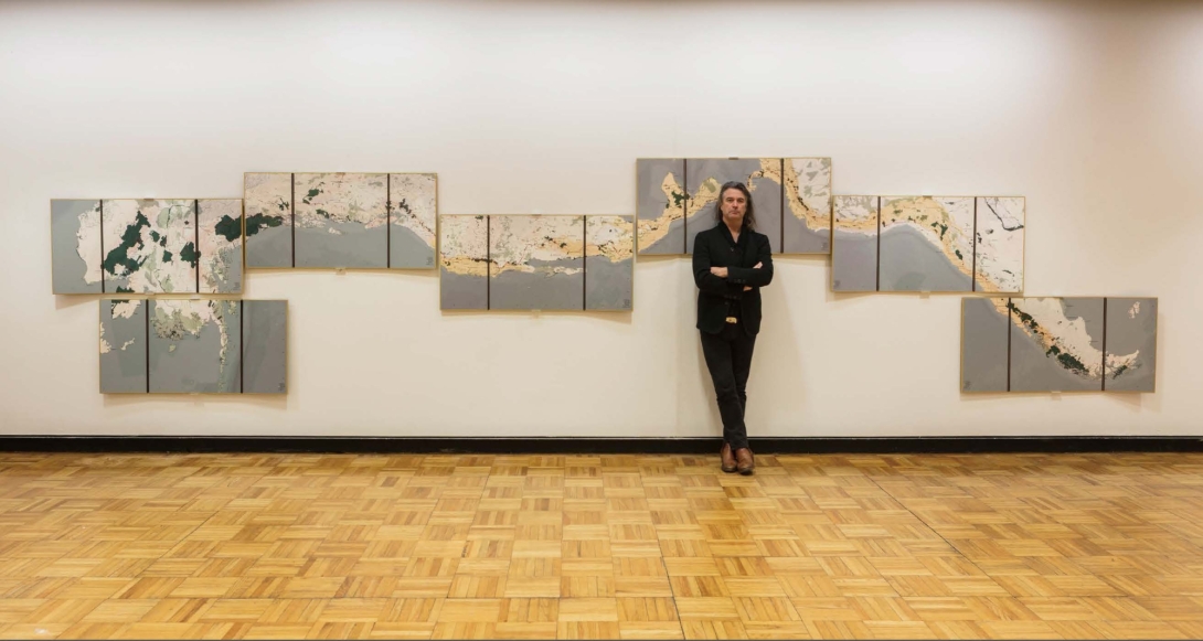 Richard Weller posing in front of a project at Meyerson Hall