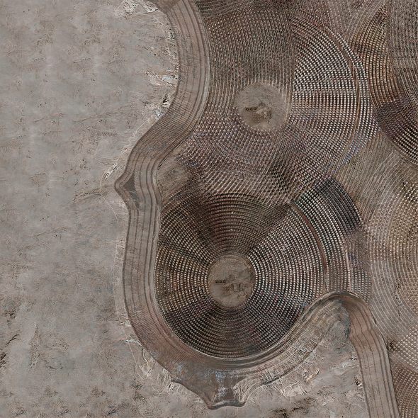 Vignette aerial of the solar facility that occupies the top of an artificial mesa in the desert outside of Las Vegas, Nevada