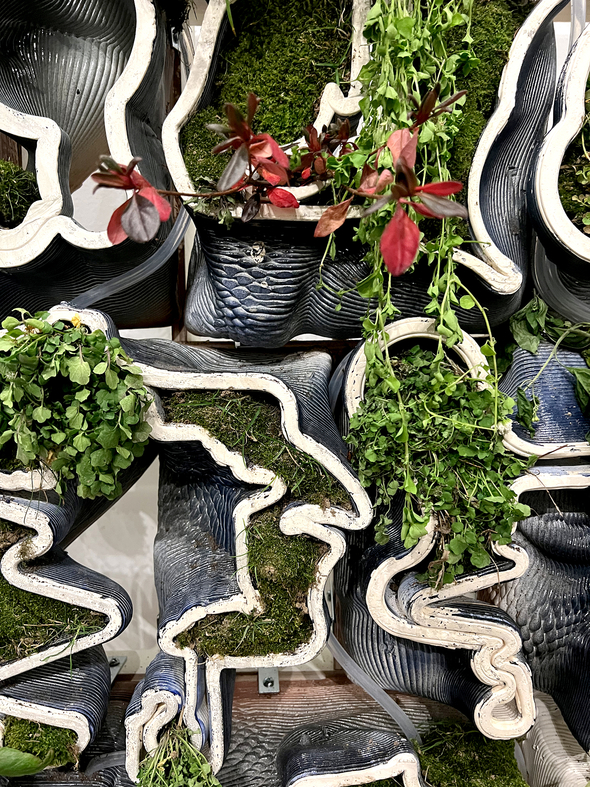 Detail of an architectural model that incorporates real plants