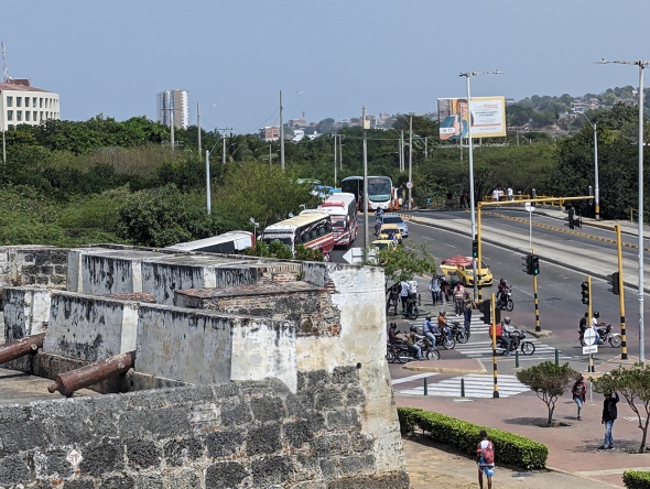 Lines of buses, taxis, Ubers, and motorbikes fight to get into the historic center 