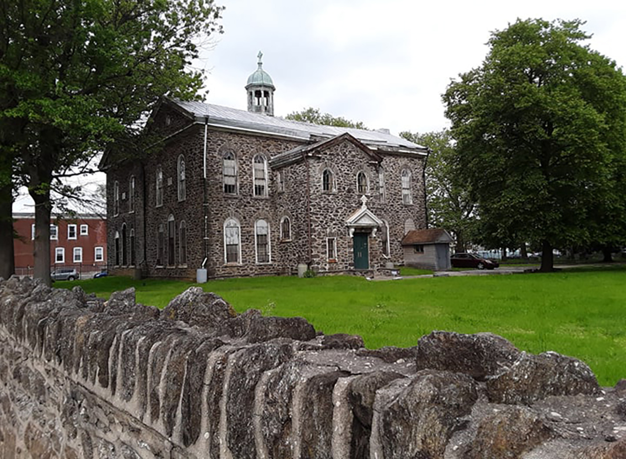 Photo of an old stone building