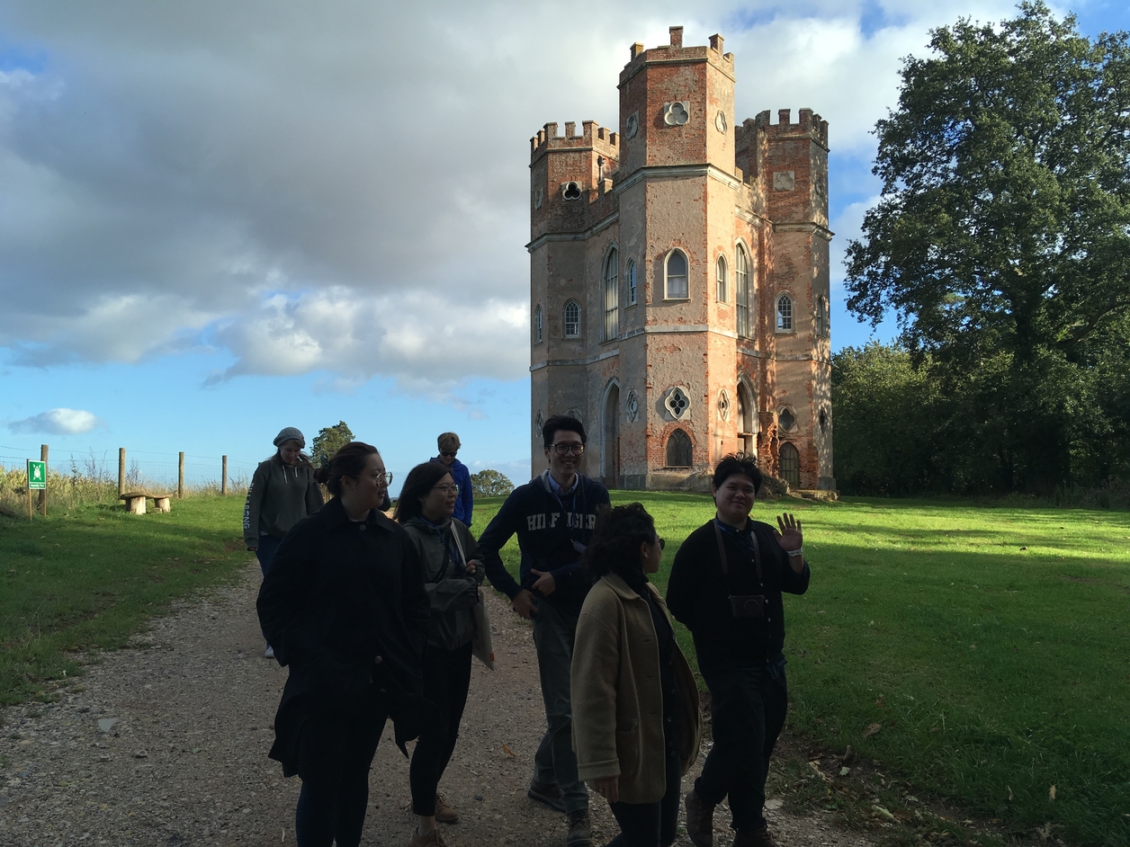Students walking outside of a castle