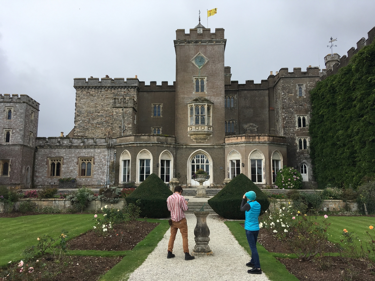 Students outside of a historic home