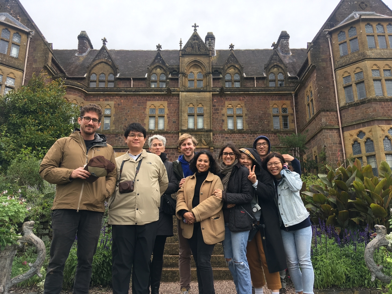 Students outside of a historic home