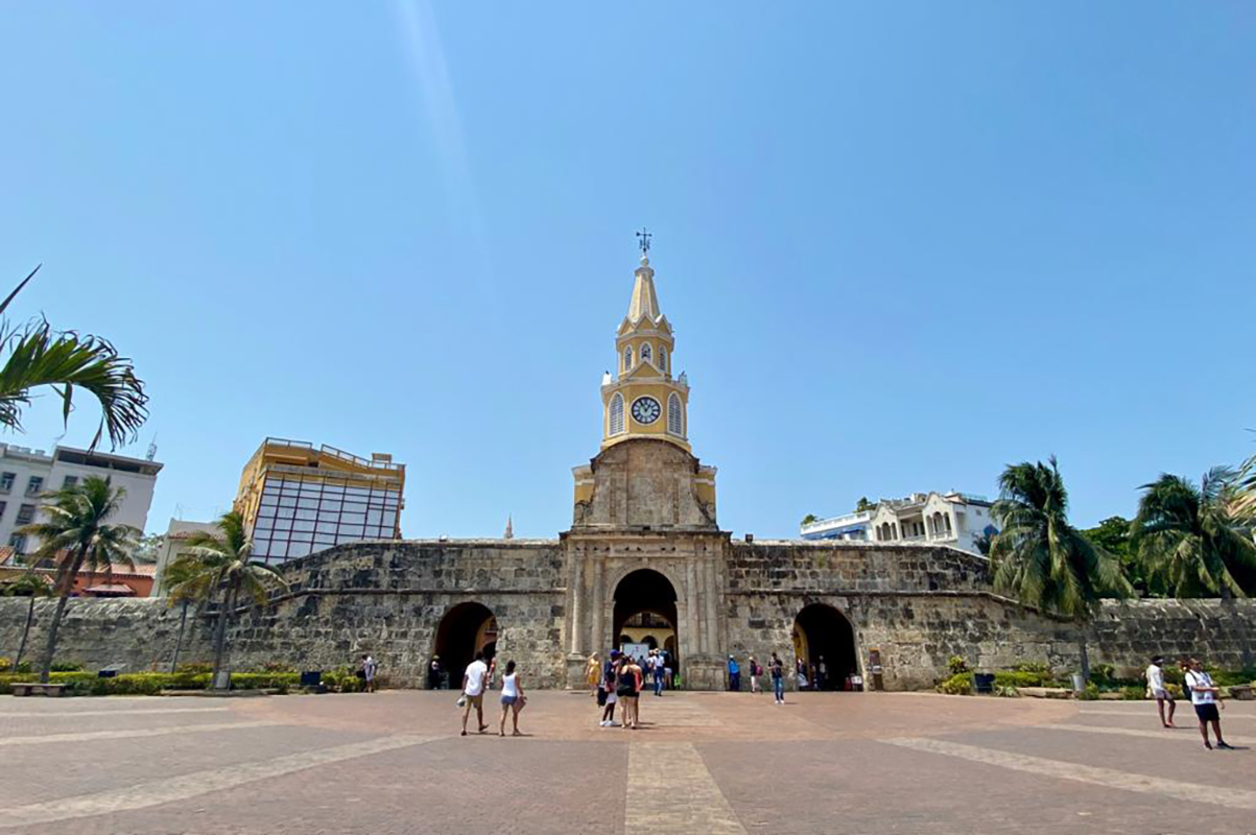 Photo of a stone tower with a clock